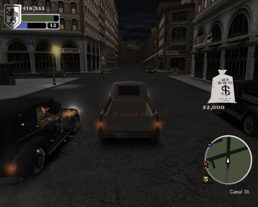 The Godfather: The Game (Windows) screenshot: Escaping with an opposing family's loot.