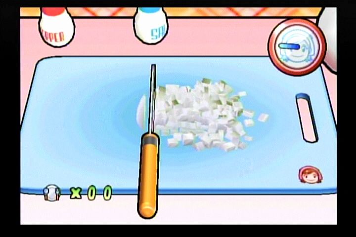 Cooking Mama: Cook Off (Wii) screenshot: Slicing with the Wiimote for chopping.