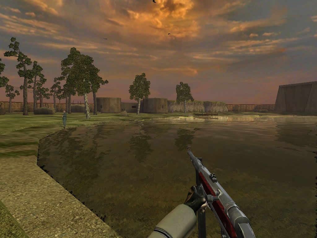 Wolfschanze (Windows) screenshot: An area with a lake and a few soldiers.