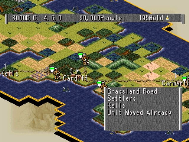 Sid Meier's Civilization II (PlayStation) screenshot: Settlers are building roads around Cardiff.