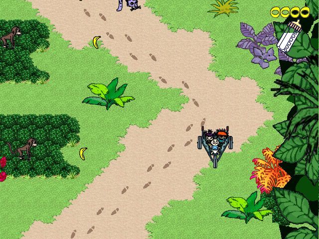 Rugrats Go Wild (Windows) screenshot: Try to avoid monkeys, shoot at the logs in the way, and stay ahead of the jaguar!