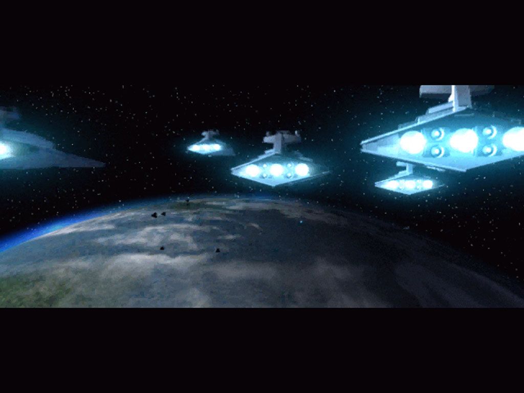 Star Wars: Force Commander (Windows) screenshot: Opening cinematic - Imperial star destroyers descend to invade a planet.