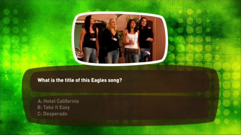 The X Factor: Interactive TV Game (DVD Player) screenshot: A sample Round Two question - identify the song these contestants are singing