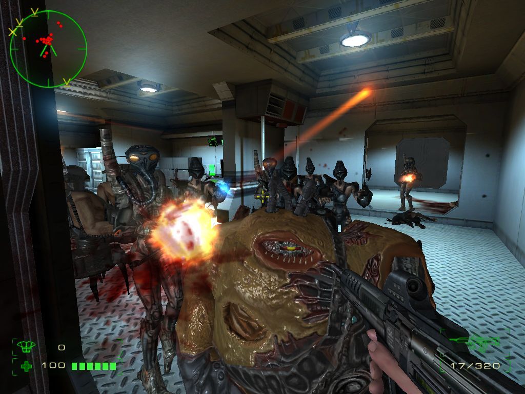 Operation: Matriarchy (Windows) screenshot: By the time you get to the second level of the ship, enemies come at you in crazy numbers and they're getting uglier and stranger.