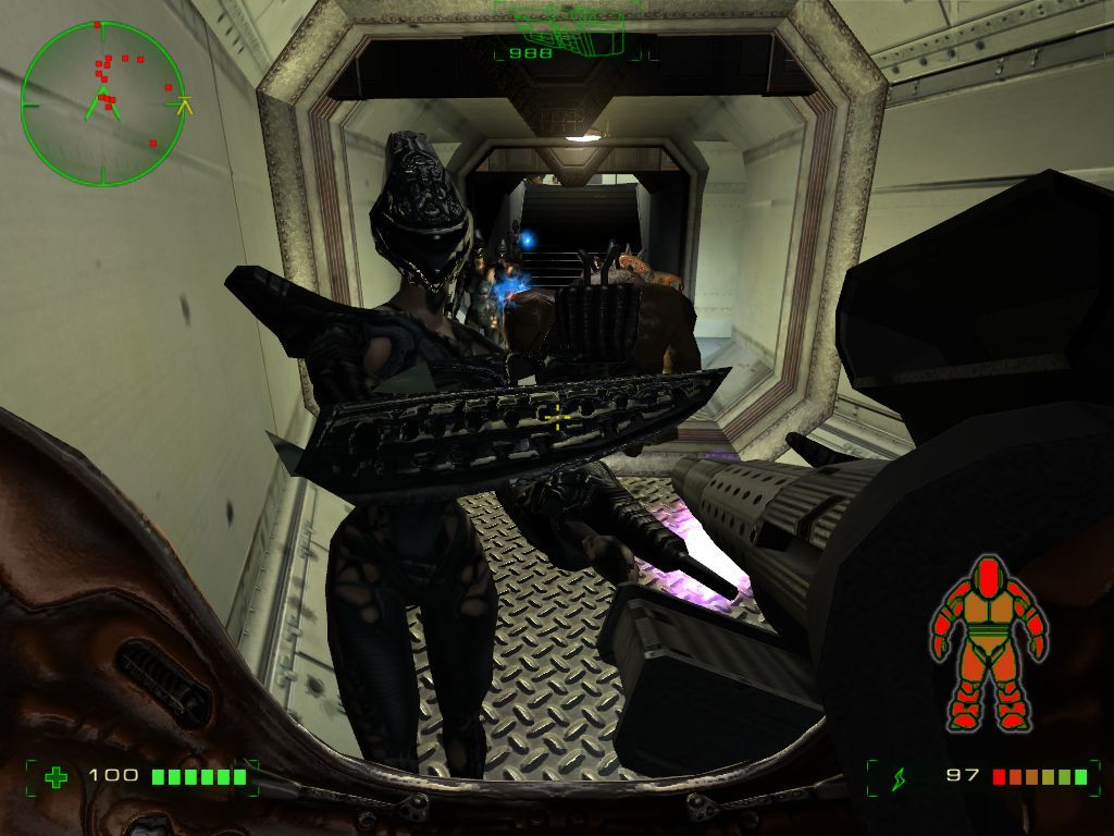 Operation: Matriarchy (Windows) screenshot: Inside the lighter armored suit. A Velian takes a swing at me.