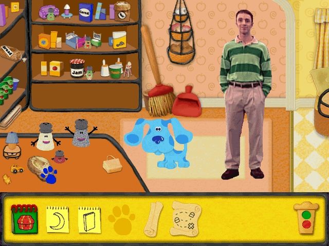 Blue's Clues: Blue's Treasure Hunt (Windows) screenshot: The blue pawprint is a "Blue's Clue", telling you this object is important in some way.