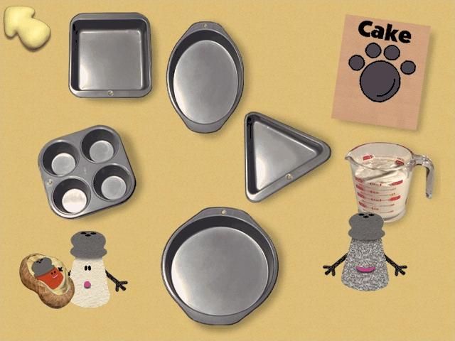 Blue's Clues: Blue's Birthday Adventure (Windows) screenshot: Ready to pour the cake batter now, to make a cake in the shape of a pawprint