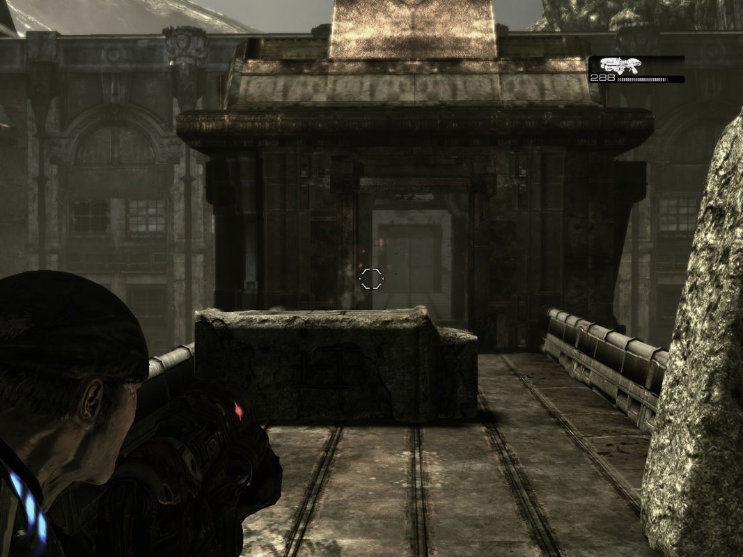 Gears of War (Windows) screenshot: A firefight with an enemy (currently hiding).