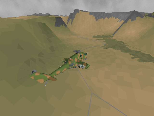 Hind (DOS) screenshot: Flying high over a valley in Afghanistan.