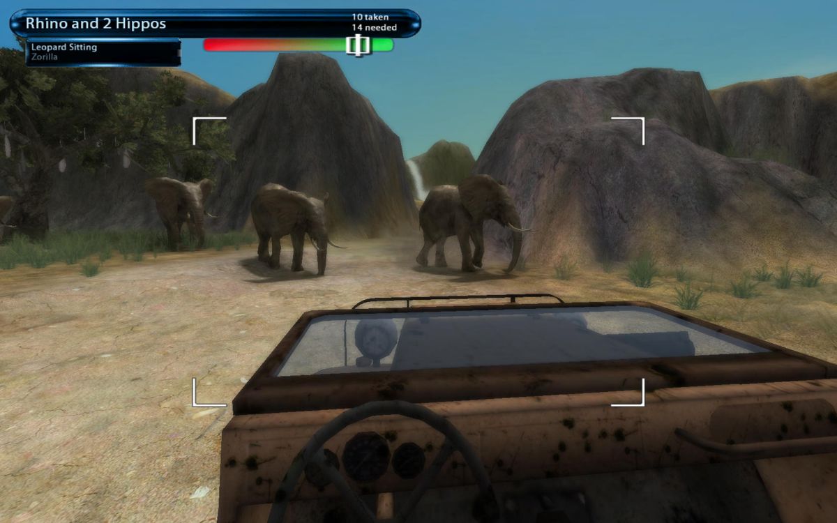 Safari Photo Africa: Wild Earth (Windows) screenshot: Three elephants blocking a way, I will have to wait for them to pass.