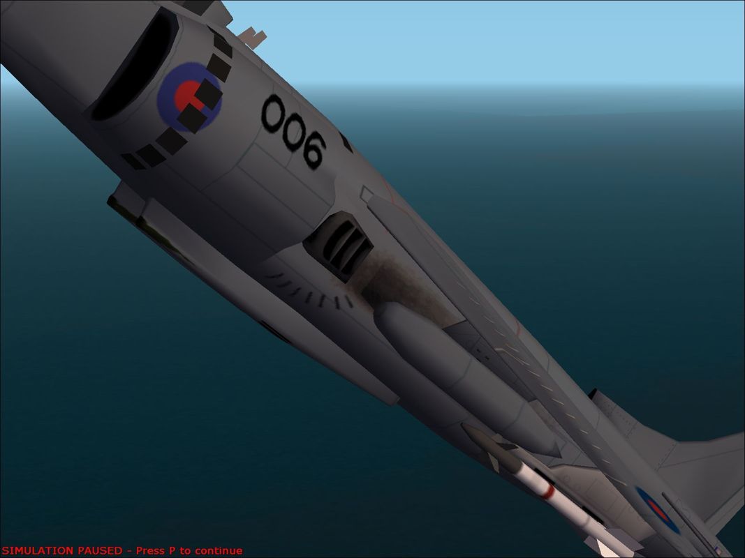 Harrier Jump Jet (Windows) screenshot: A close up of the Royal Navy Sea Harrier FRS.1 showing nice scorch marks near the exhaust