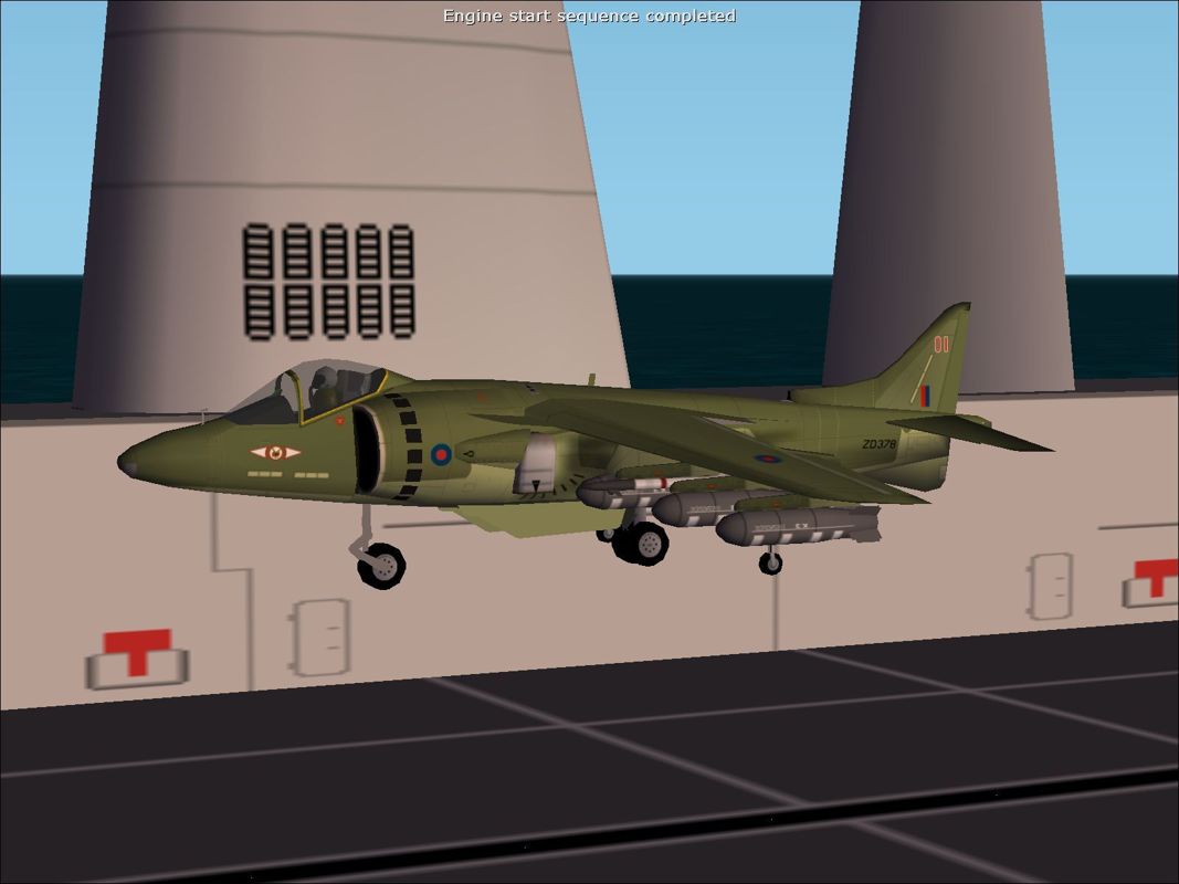 Harrier Jump Jet (Windows) screenshot: A Harrier with the fans pointing down completing a near vertical take-off from the deck of HMS Invincible.