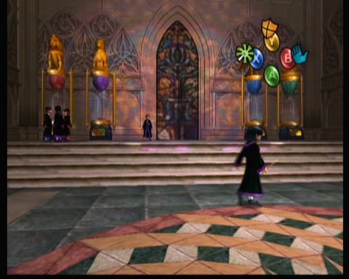 Harry Potter and the Chamber of Secrets (Xbox) screenshot: At the entrance hall, looking at other students from a 1st-person perspective