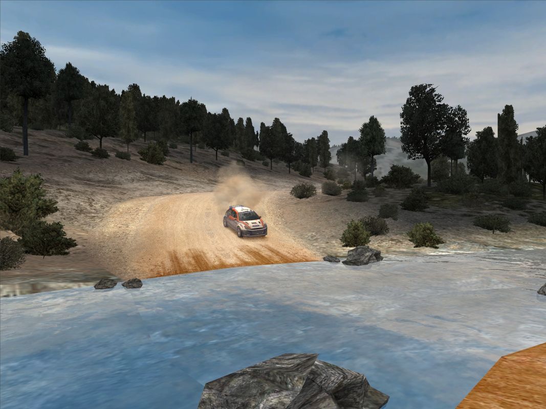 Colin McRae Rally 3 (Windows) screenshot: Watch out there is a river ahead