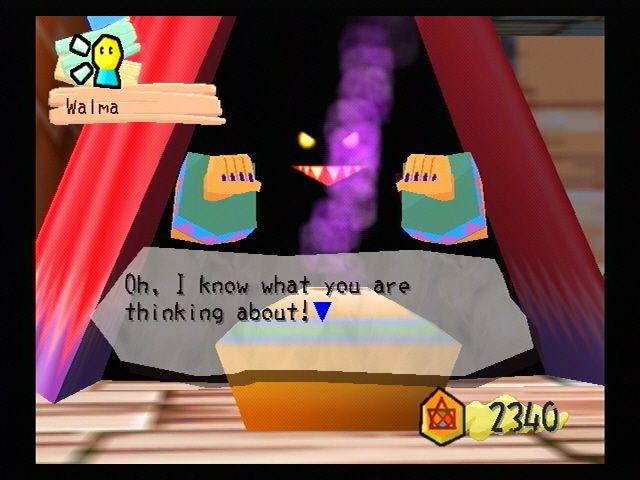 Magic Pengel: The Quest for Color (PlayStation 2) screenshot: A strange figure has appeared in town.