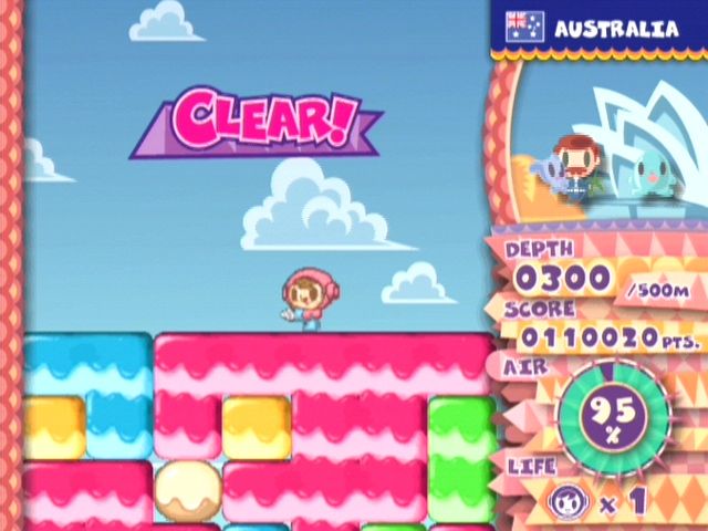 Mr. Driller: Drill Land (GameCube) screenshot: Reaching Australia and the Opera House