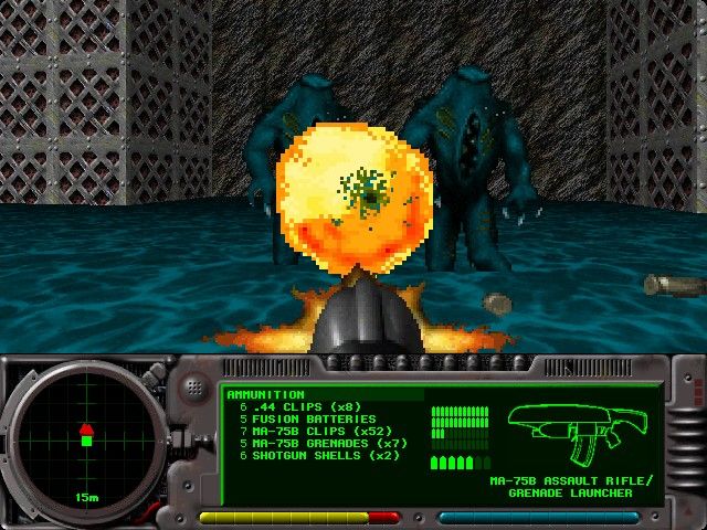 Marathon 2: Durandal (Macintosh) screenshot: Who doesn't like to shoot bullets and fire grenades at the same time?
