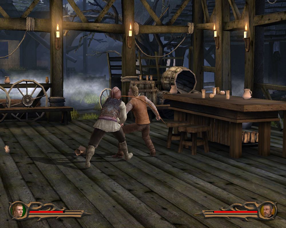 Eragon (Windows) screenshot: Fighting in town.