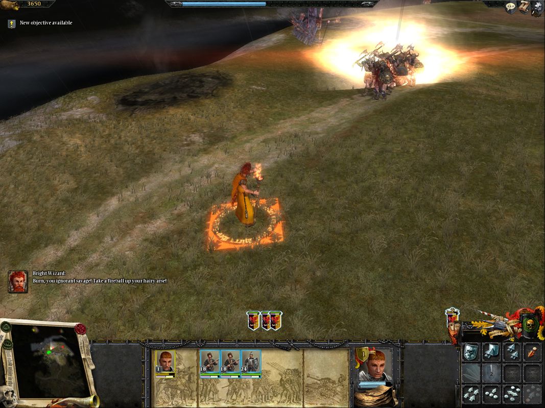 Warhammer: Mark of Chaos (Windows) screenshot: Brights are not ones to hold back. A wizard apparently likes his barbarian hordes well done.