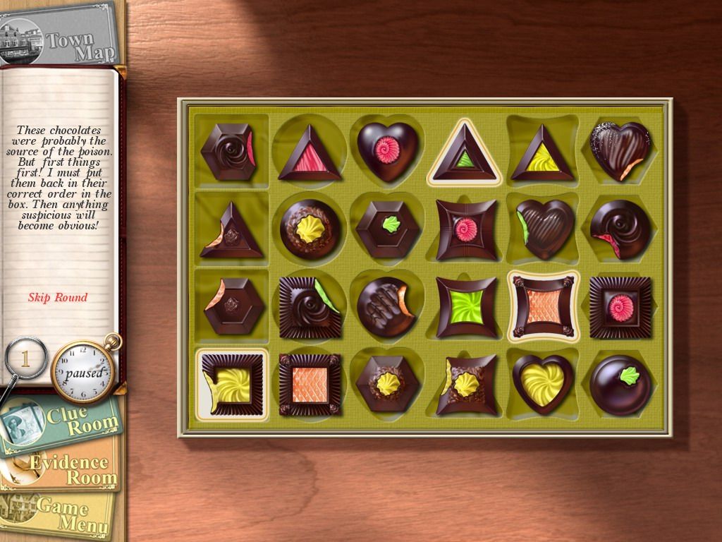 Agatha Christie: Peril at End House (Windows) screenshot: Move the chocolates of different shapes to fit their places