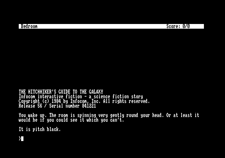 The Hitchhiker's Guide to the Galaxy (Amstrad CPC) screenshot: Opening screen/starting location. It is pitch black but DON'T PANIC!