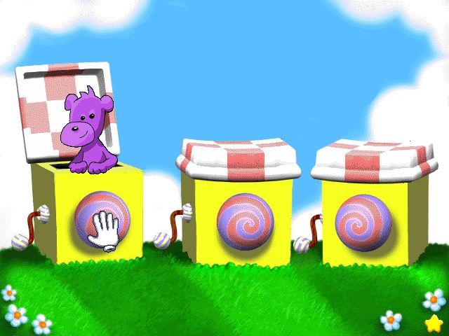 Reader Rabbit's Toddler (Windows) screenshot: In Pop & Play Place, pressing the button on each box causes an animal to pop up - the object is to make three of the same