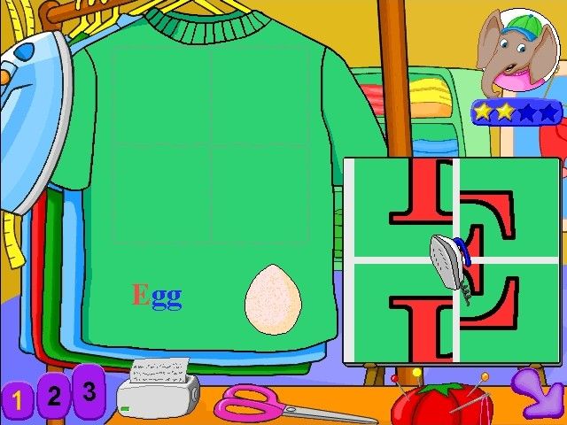 JumpStart Pre-K (Windows) screenshot: Click to move each part of the letter onto the t-shirt