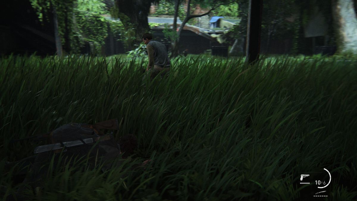 The Last of Us: Part II (PlayStation 4) screenshot: Sneaking around the enemy through a tall grass