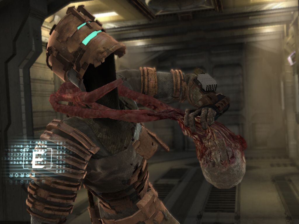 Dead Space (Windows) screenshot: A "tentacle-head" is trying to rip my head off...