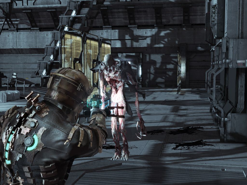 Dead Space (Windows) screenshot: This type of necromorph is very annoying. If you try to kill it, it will just split into several small (and fast) enemies.