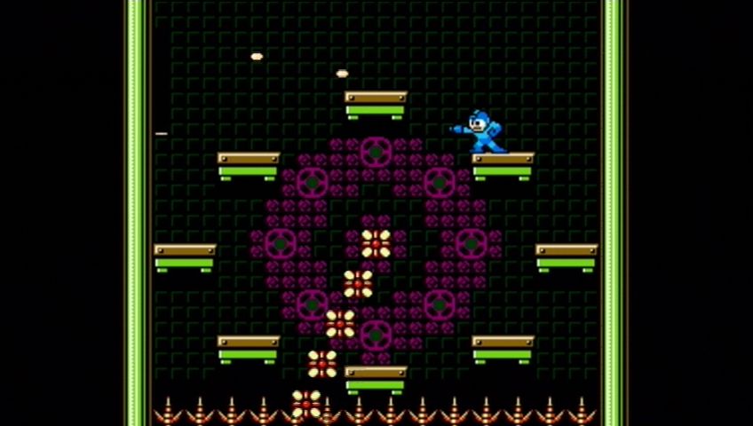 Mega Man 9 (Xbox 360) screenshot: Dodge the rotating flowers while trying to kill the disappearing enemy!