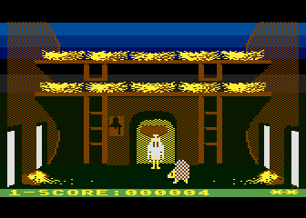 Chicken Chase (Atari 8-bit) screenshot: A rat has entered the henhouse.