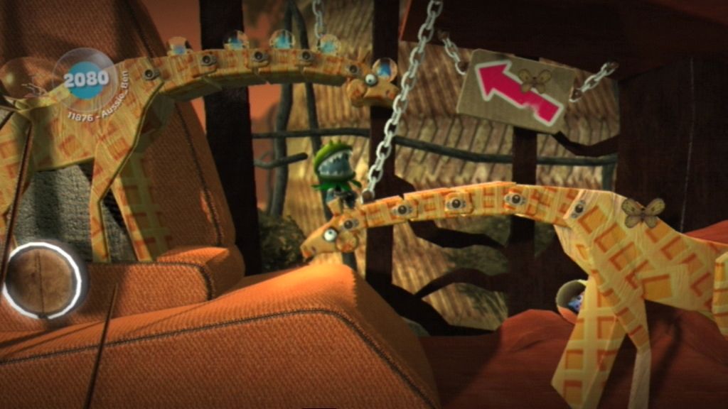 LittleBigPlanet (PlayStation 3) screenshot: Ride on these giraffe necks to reach higher areas