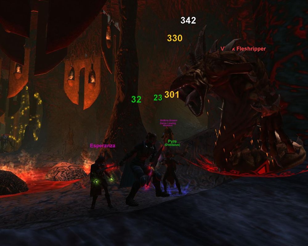 Vanguard: Saga of Heroes (Windows) screenshot: The party fighting in a dark dungeon.
