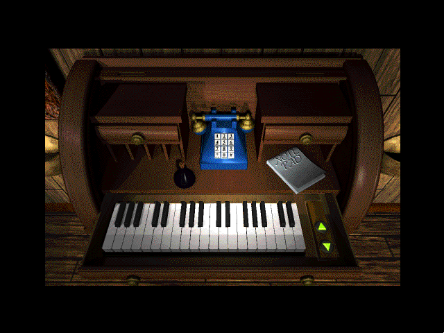 The Manhole: CD-ROM Masterpiece Edition (Windows 16-bit) screenshot: Desk keyboard