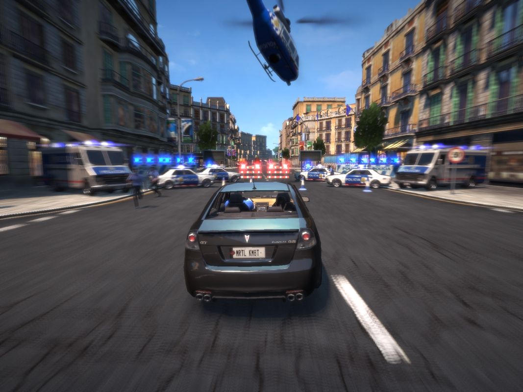 Wheelman (Windows) screenshot: Mortal Kombat is about to crash through a police blockade.