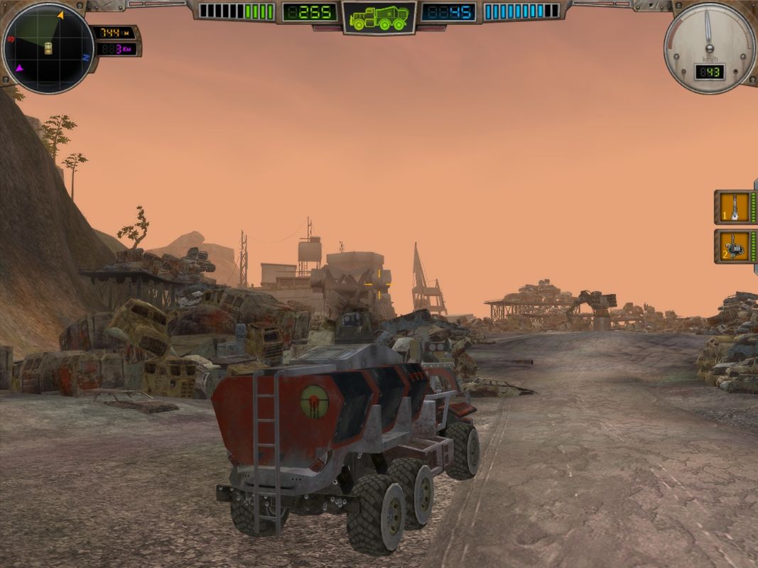 Hard Truck: Apocalypse - Rise of Clans (Windows) screenshot: Passing through a junkyard at dusk.