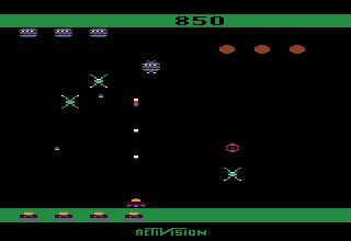 Spider Fighter (Atari 2600) screenshot: Fighting some spiders...