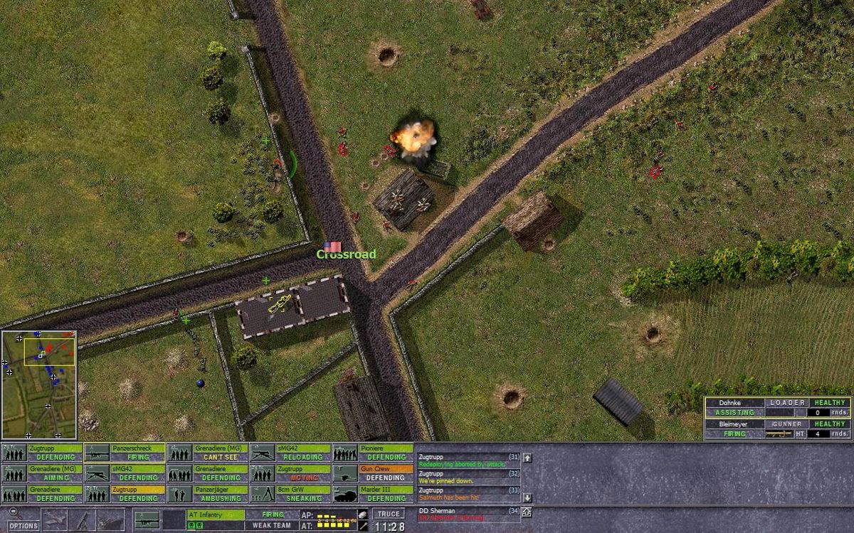 Close Combat: The Longest Day (Windows) screenshot: A German panzerschreck team manages to destroy an Allied Sherman.