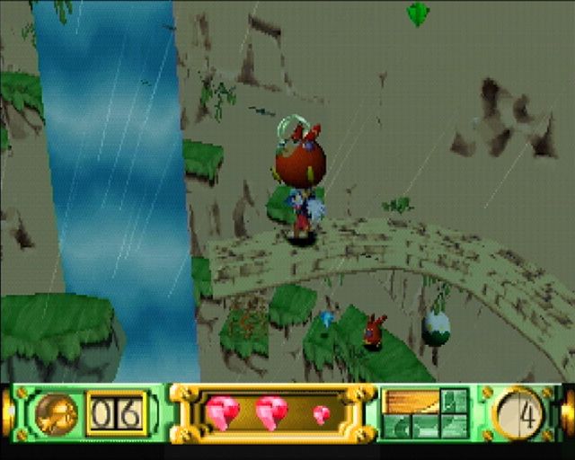 Klonoa: Door to Phantomile (PlayStation) screenshot: It starts to rain as you reach the waterfall