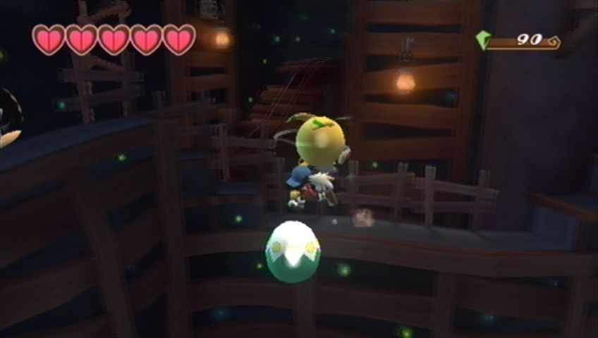Klonoa (Wii) screenshot: Throw an enemy towards the screen to hit this egg