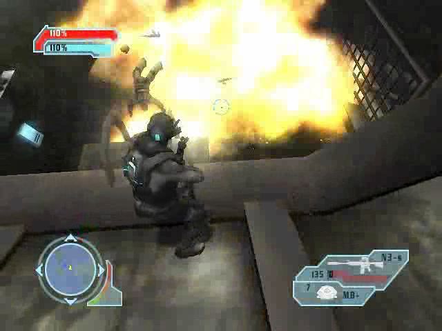 Special Forces: Nemesis Strike (PlayStation 2) screenshot: Stealth Owl firing at fuel barrels to destroy more enemies.