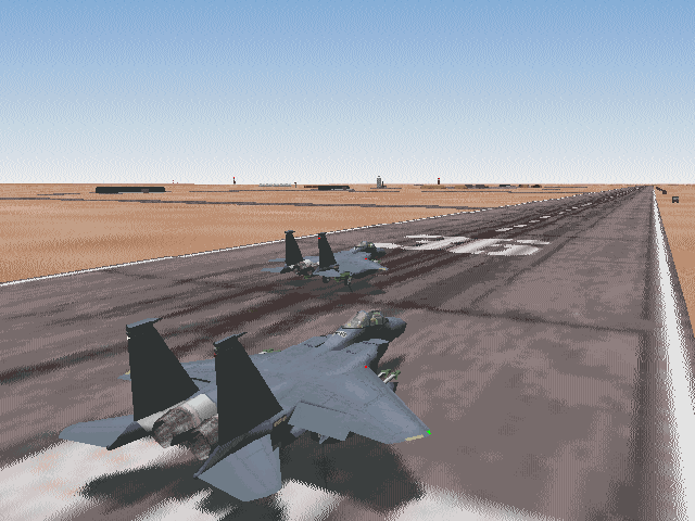 Jane's Combat Simulations: F-15 (Windows) screenshot: Two Strike Eagles on the runway waiting for take-off clearance.