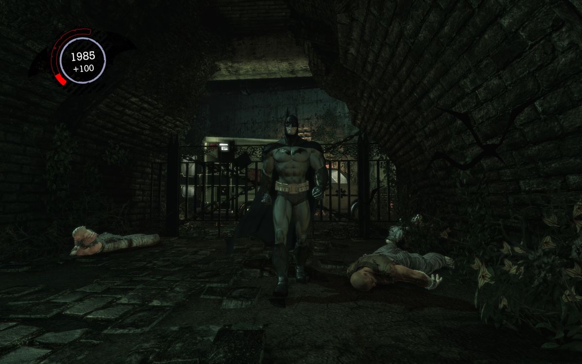 Batman: Arkham Asylum (Windows) screenshot: Two goons down - one Bat up.