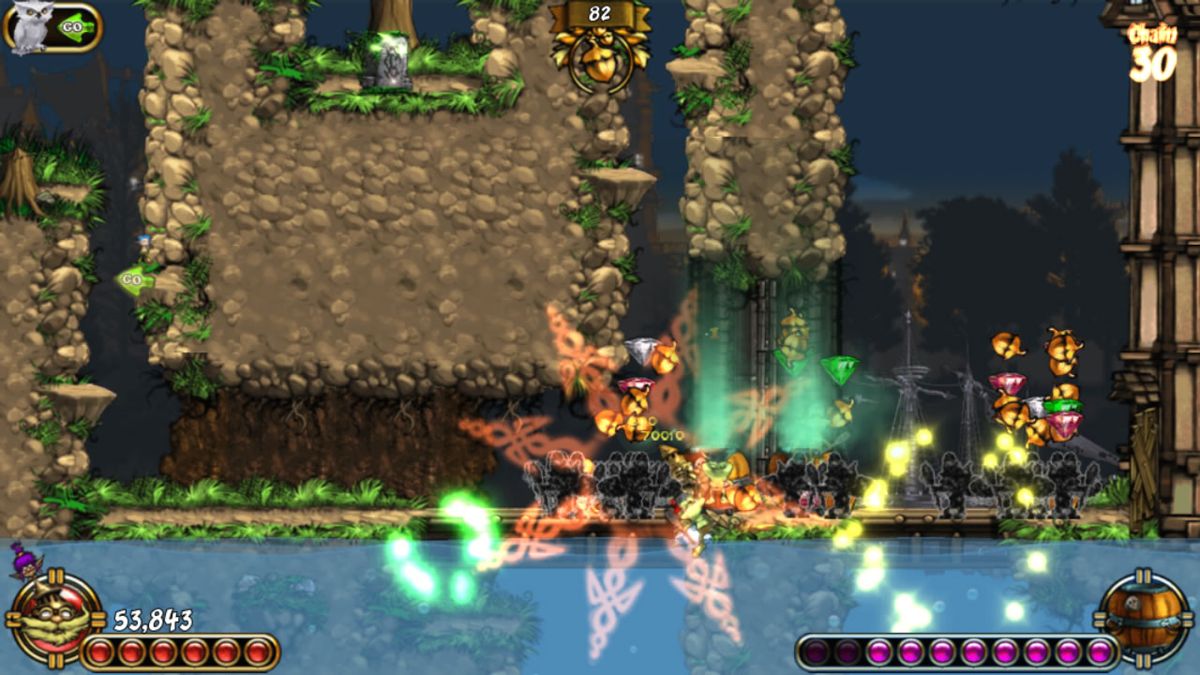 Emberwind (Windows) screenshot: Fireworks damages all enemies on the screen. Above is one of the rare fairy stones.