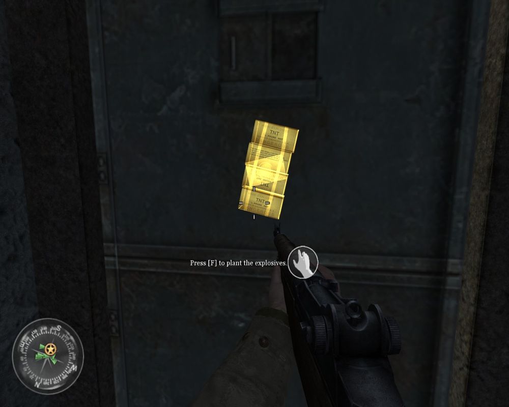 Call of Duty 2 (Windows) screenshot: Placing an explosive.
