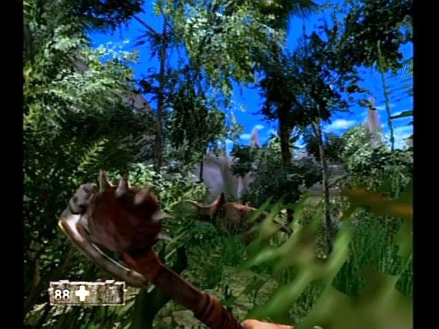 Turok: Evolution (GameCube) screenshot: Taking cover from guard arrow shots but careful, don't spook the dinos.