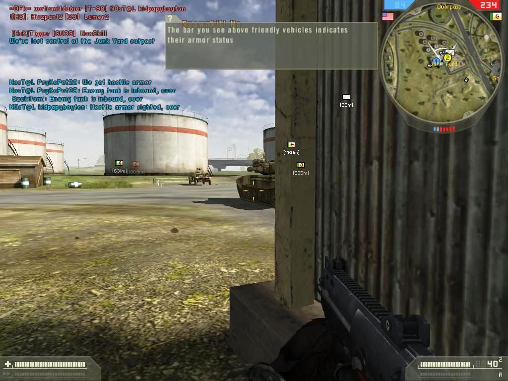 Battlefield 2: Booster Pack - Armored Fury (Windows) screenshot: MEC T-90 BMT is taking the flag and doesn't notice I’m in the vehicle shed.