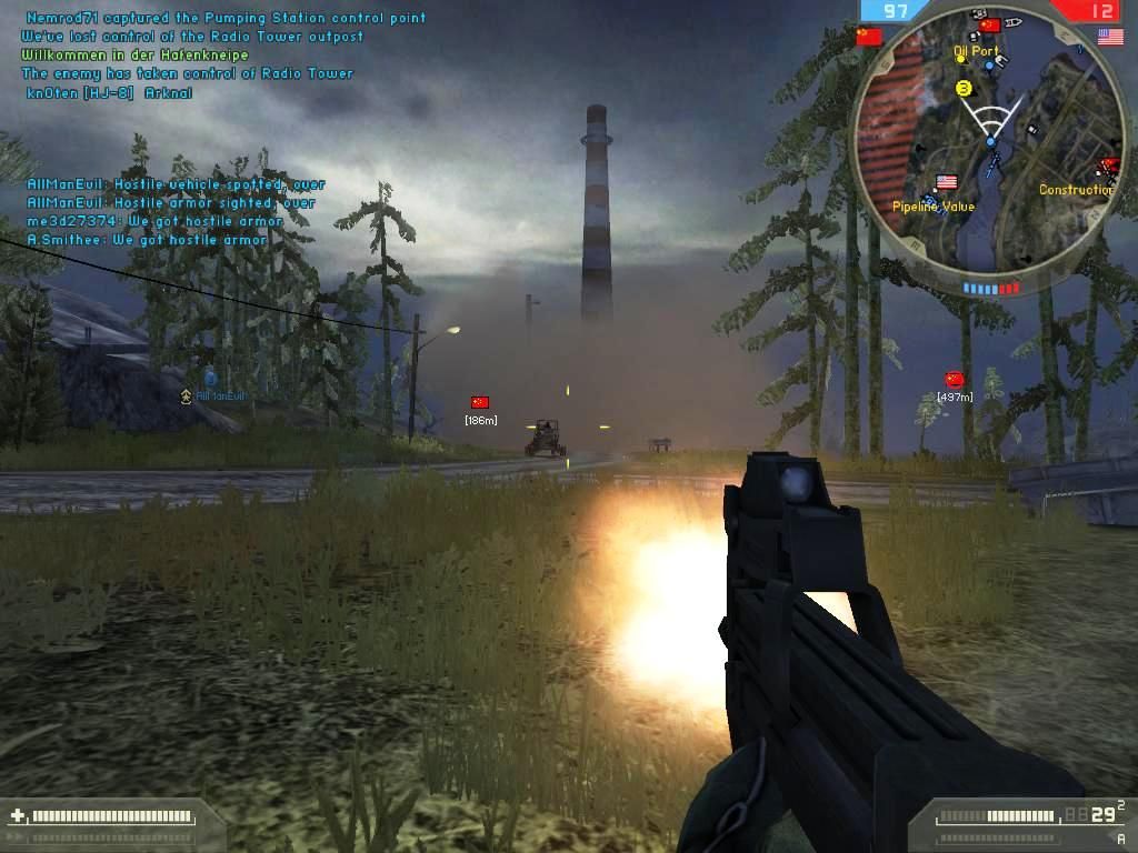 Battlefield 2: Booster Pack - Armored Fury (Windows) screenshot: Another US buggy zooms by and I'm out of SRAW ammo... so I switch to the P90 as an artillery strike impacts the flag.