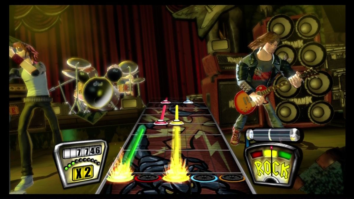 Guitar Hero II (Xbox 360) screenshot: Press the buttons on the guitar controller as the notes scroll toward you.